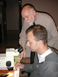 Joe Barabe talking a student through sample collection.
